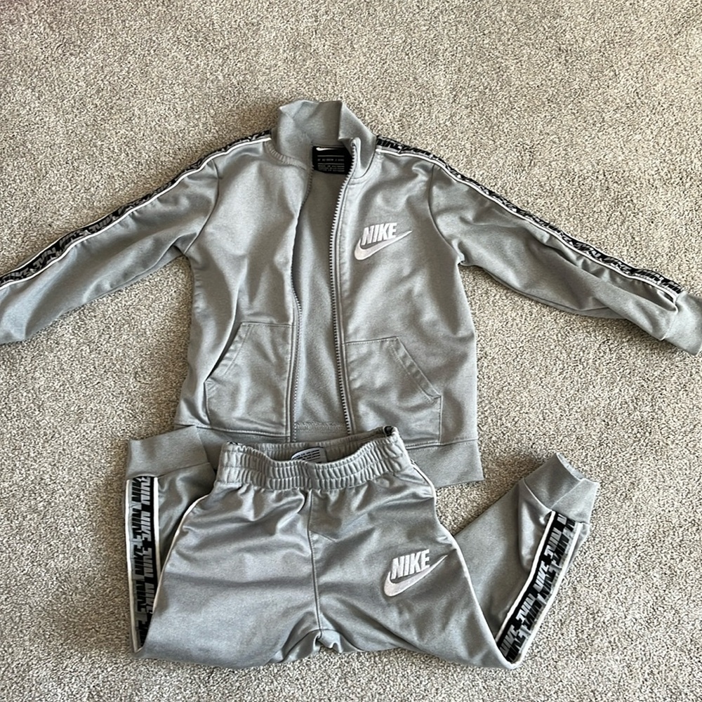 Gray Nike track suit